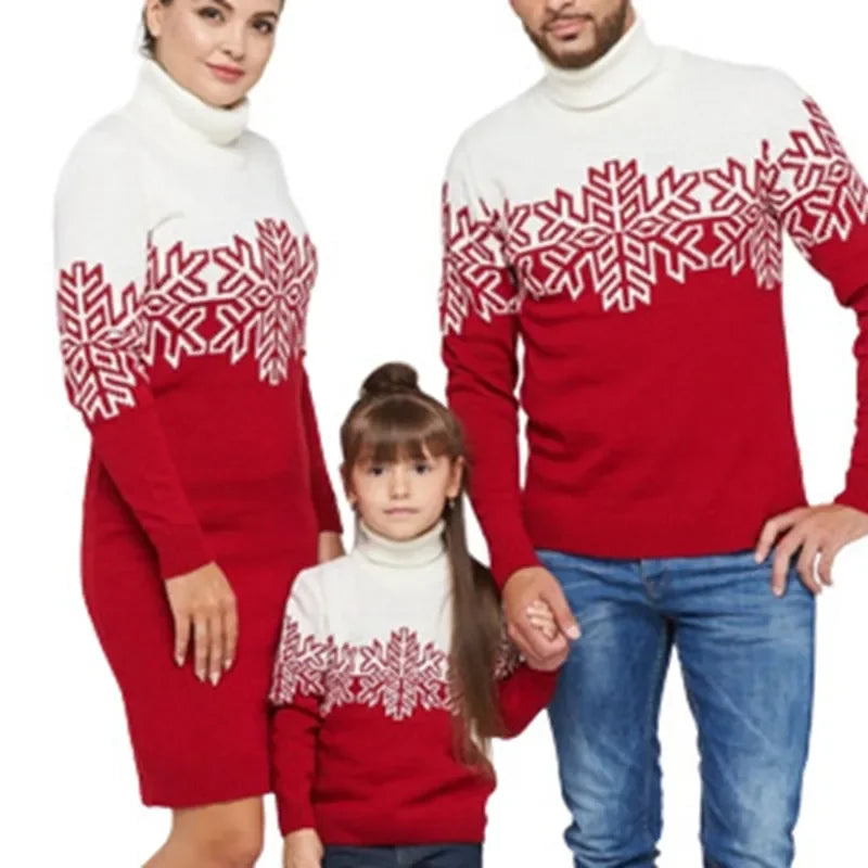 Man wearing a matching Christmas jumper with a snowflake design with his family