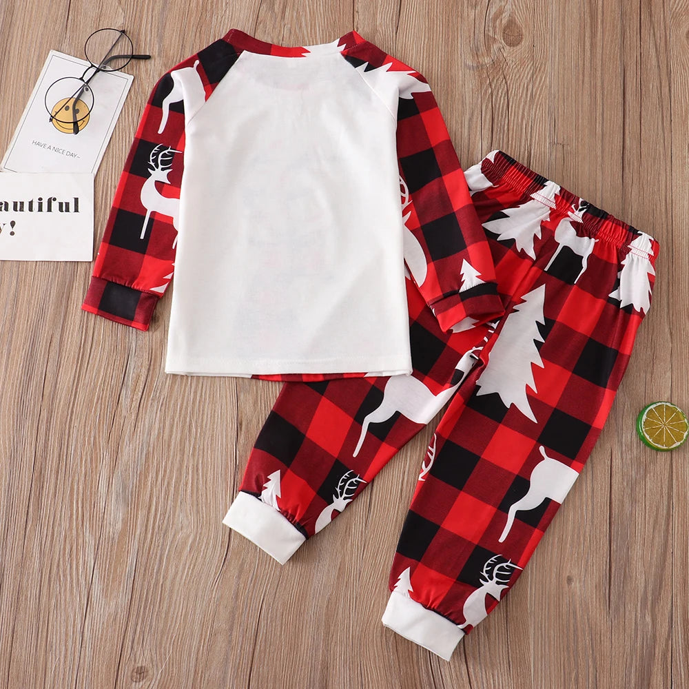 Matching red plaid pyjamas for festive family nights