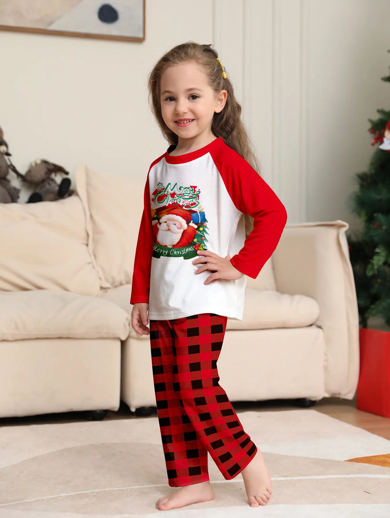 Matching holiday pyjamas with cheerful Santa design
