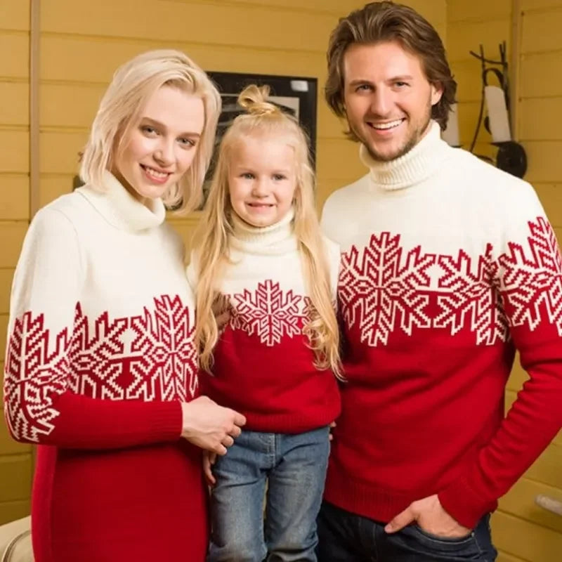 Man and family wearing festive jumper featuring a snowflake motif