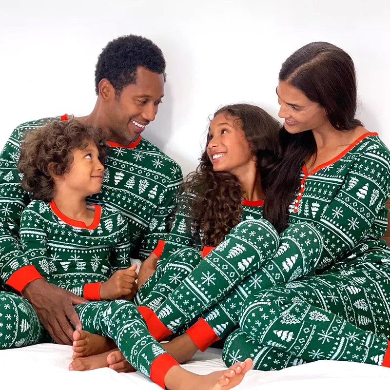 Festive holiday sleepwear in green for the whole family