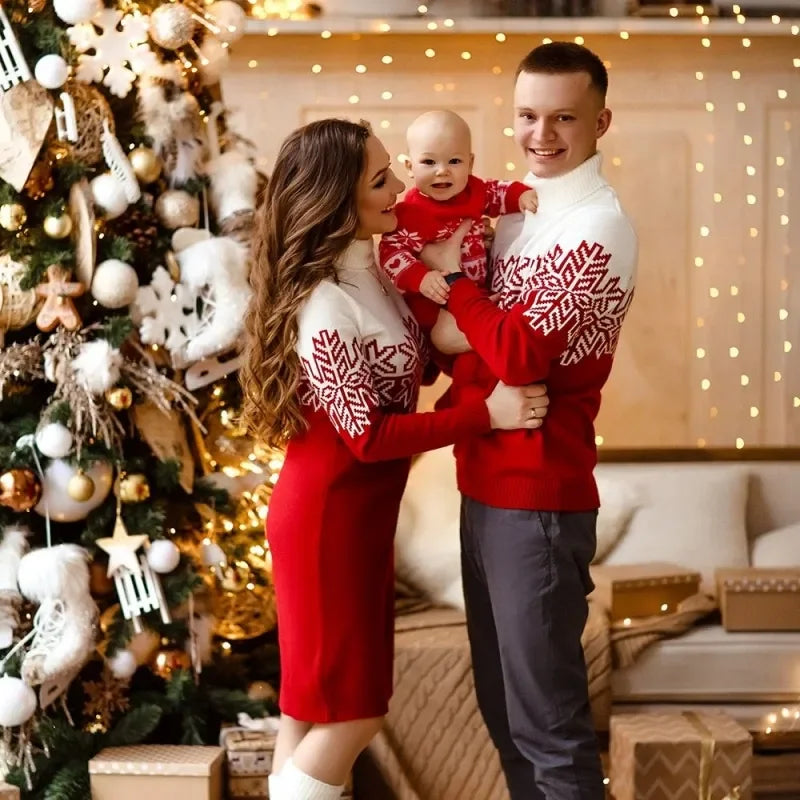 Man with his family wearing a Christmas jumper with a matching snowflake design