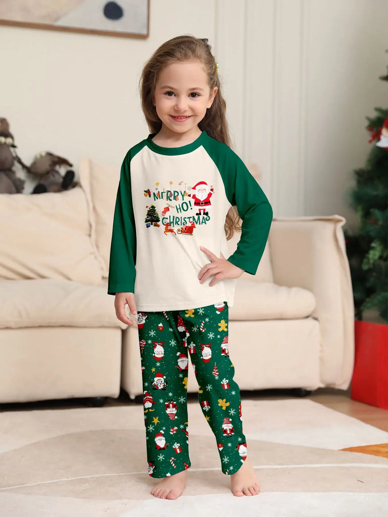 Matching Christmas pyjamas with green Santa for families