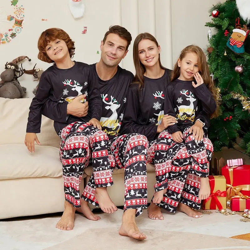 Whimsical "naughty or nice" themed pajamas for family