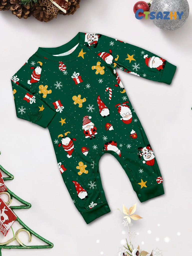 Matching family pyjamas with festive green Santa print