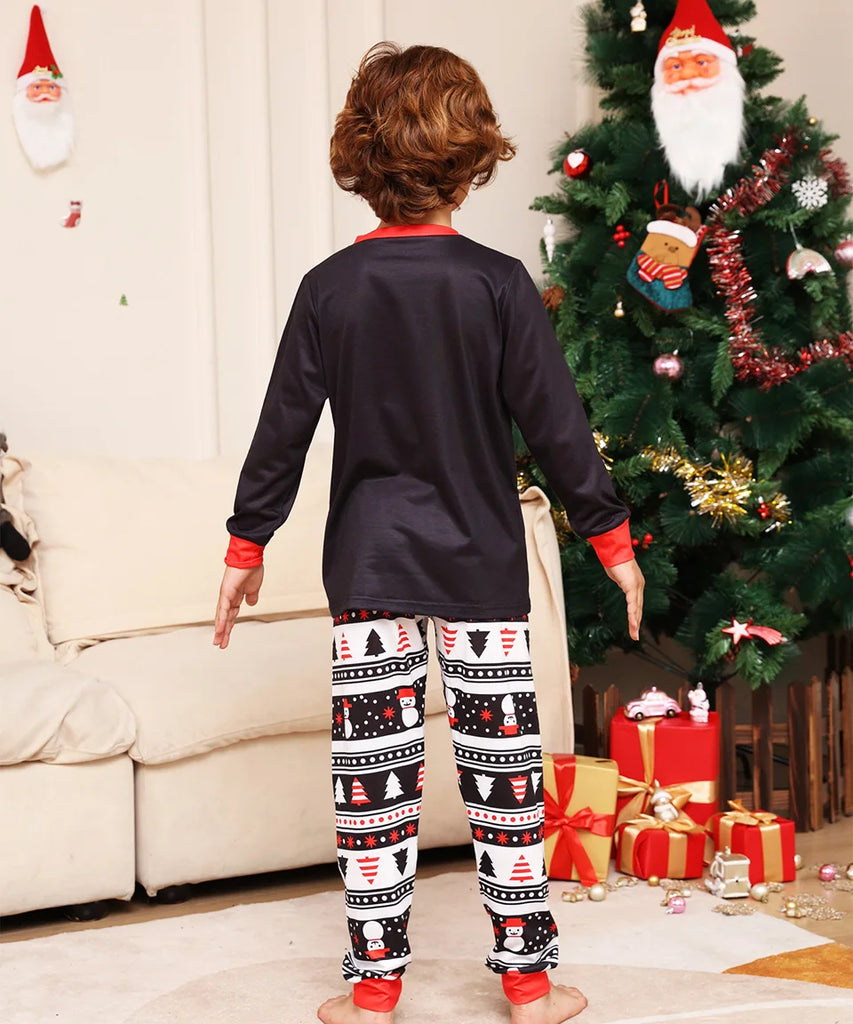 Soft pyjamas with "Happy New Year" Santa motif