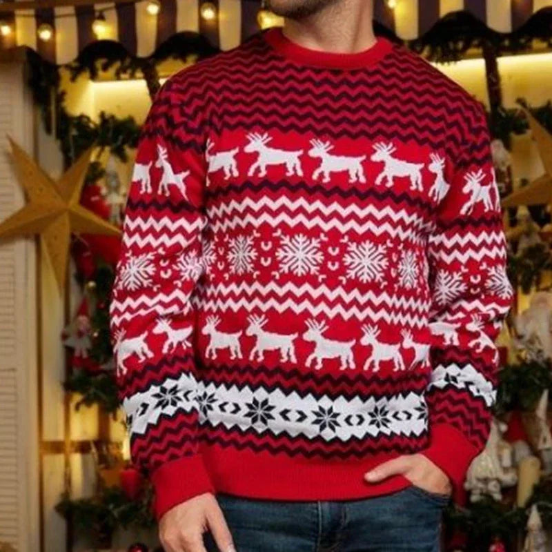 Man wearing a matching red Christmas jumper with a reindeer