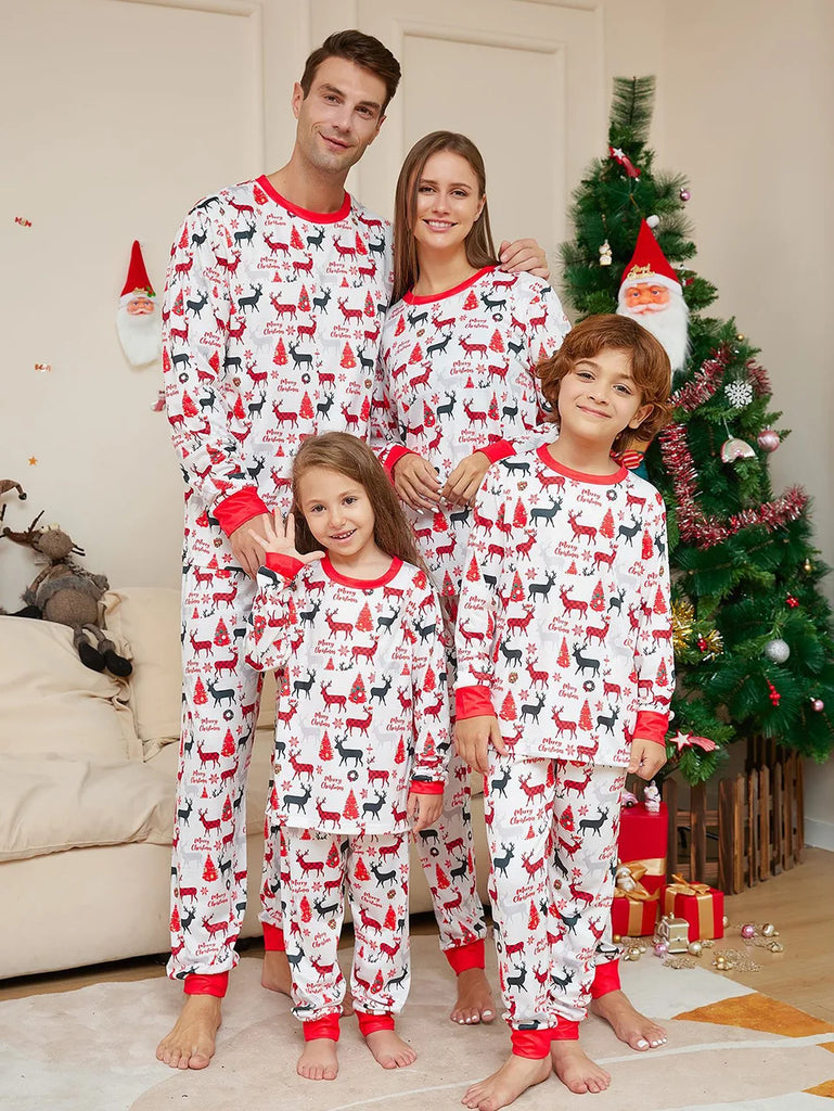 Matching forest-themed pyjamas for festive nights