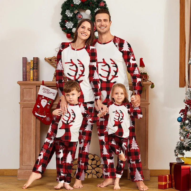 Matching holiday pyjamas with red plaid pattern