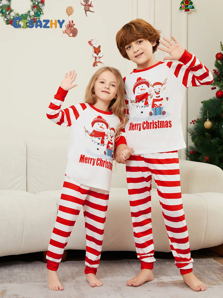 Family pyjama set featuring playful snowman design