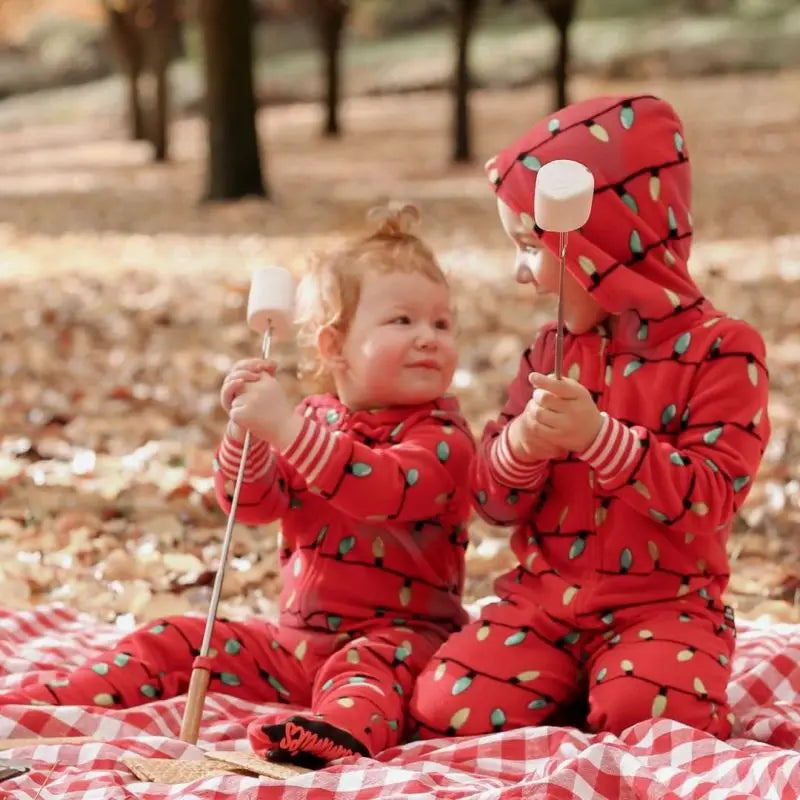 Matching red-themed pajamas for family