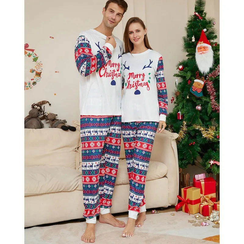 Kids and adults in festive white pajamas