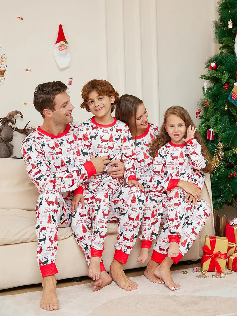 Holiday pyjamas featuring Christmas trees and animals