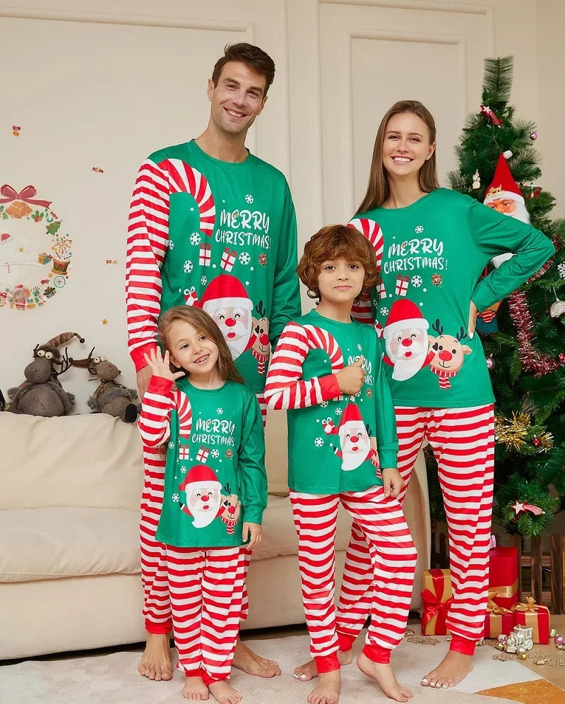 Matching Christmas candy cane pajamas making memories